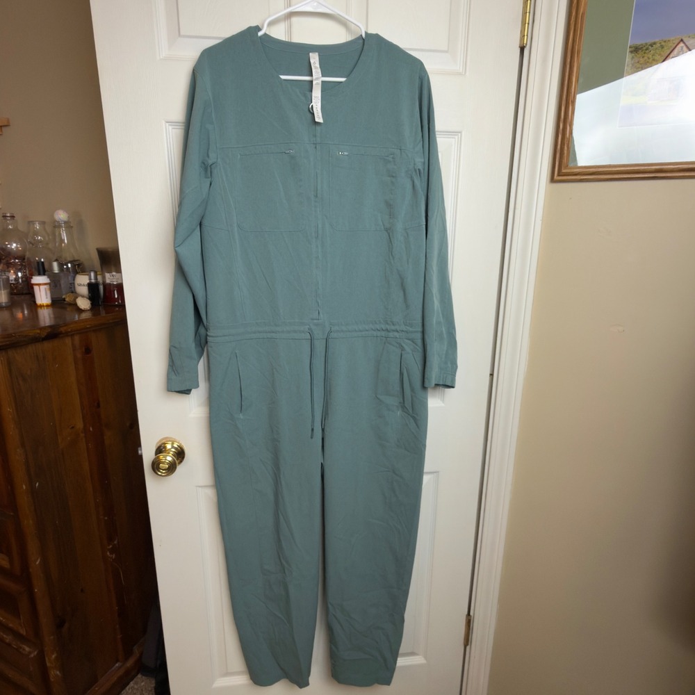 Lululemon Ventlight Zippered Jumpsuit Tidewater Teal Long Sleeve‎ Size 10..FLAW